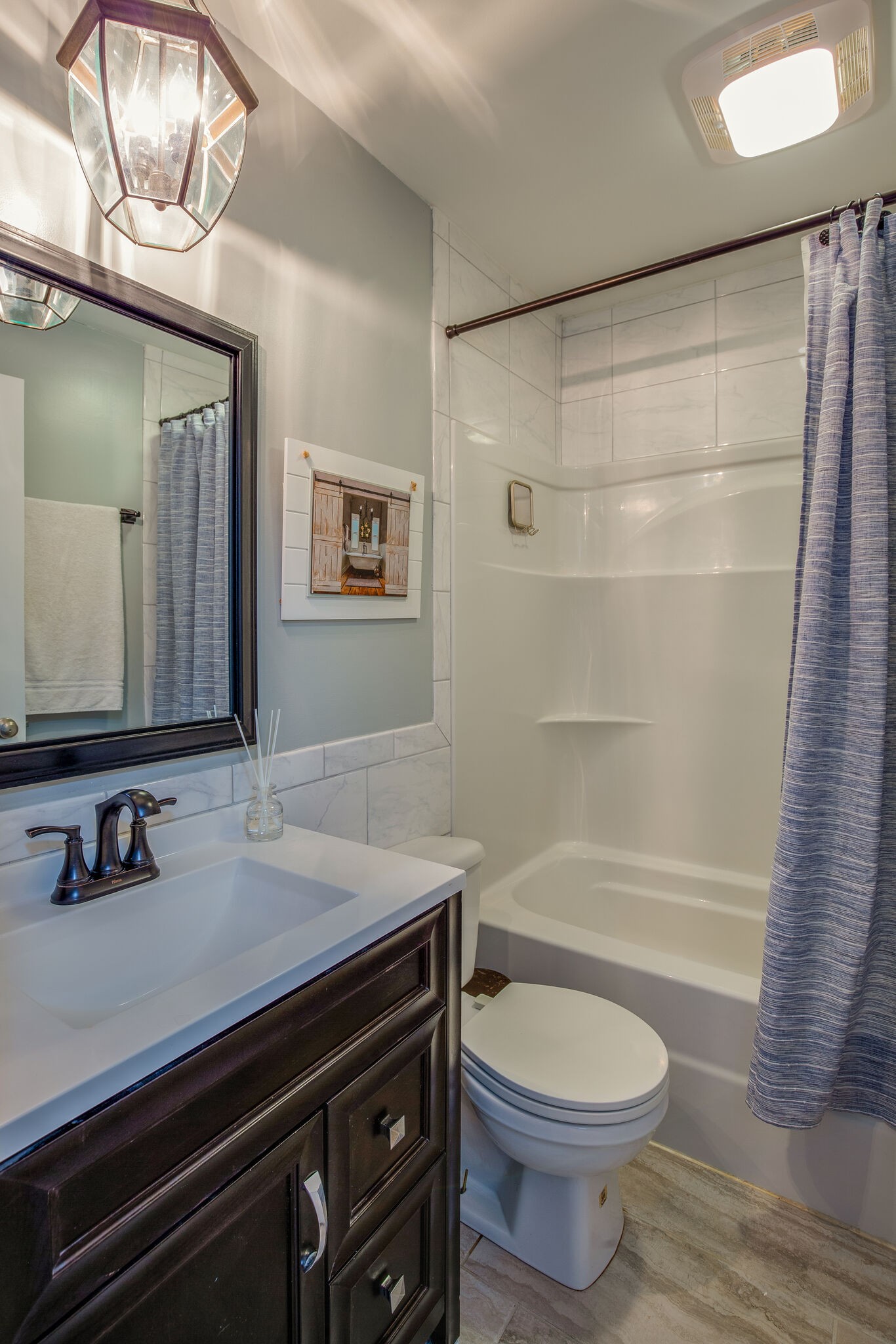 5111 Hickory Ridge Road Lebanon, TN 37090 - Photo 20 of 53 a bathroom with a sink a toilet and shower