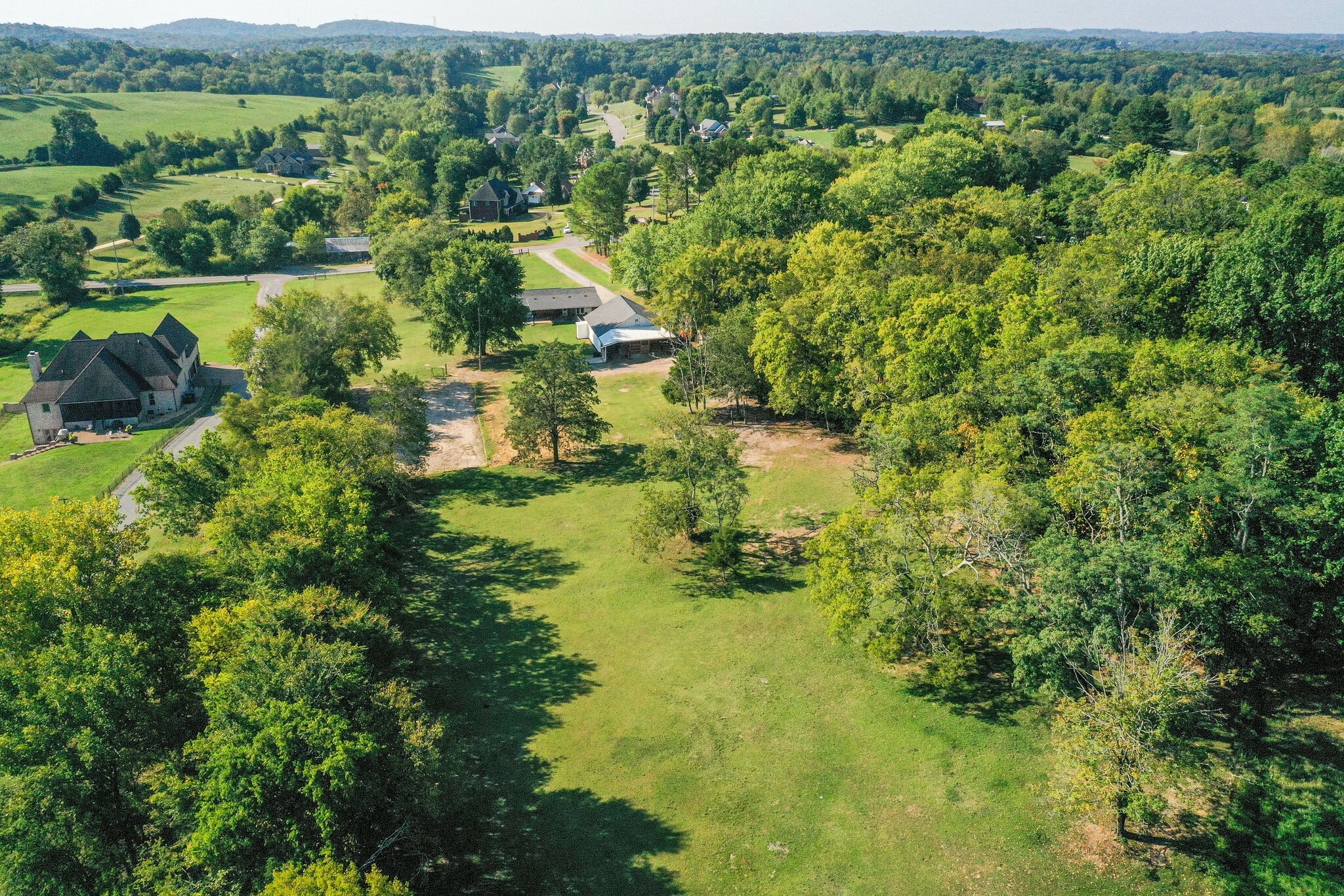 5111 Hickory Ridge Road Lebanon, TN 37090 - Photo 38 of 53 an aerial view of residential houses with outdoor space and trees all around