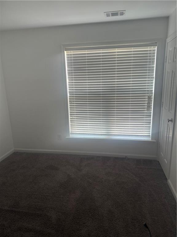 3282 Saville Street Southwest Atlanta, GA 30331 - Photo 11 of 13 a view of a room that has a window in it