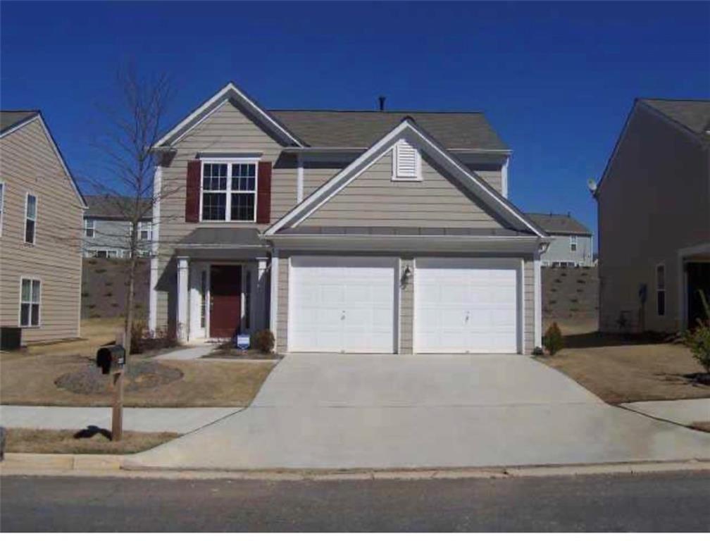 3282 Saville Street Southwest Atlanta, GA 30331 - Photo 3 of 13 a front view of a house with a yard