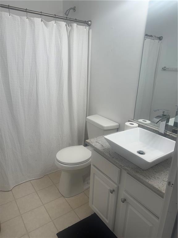 3282 Saville Street Southwest Atlanta, GA 30331 - Photo 9 of 13 a bathroom with a sink a toilet and shower