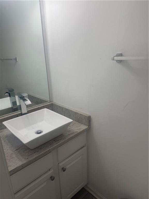 3282 Saville Street Southwest Atlanta, GA 30331 - Photo 10 of 13 a bathroom with a sink vanity and a mirror