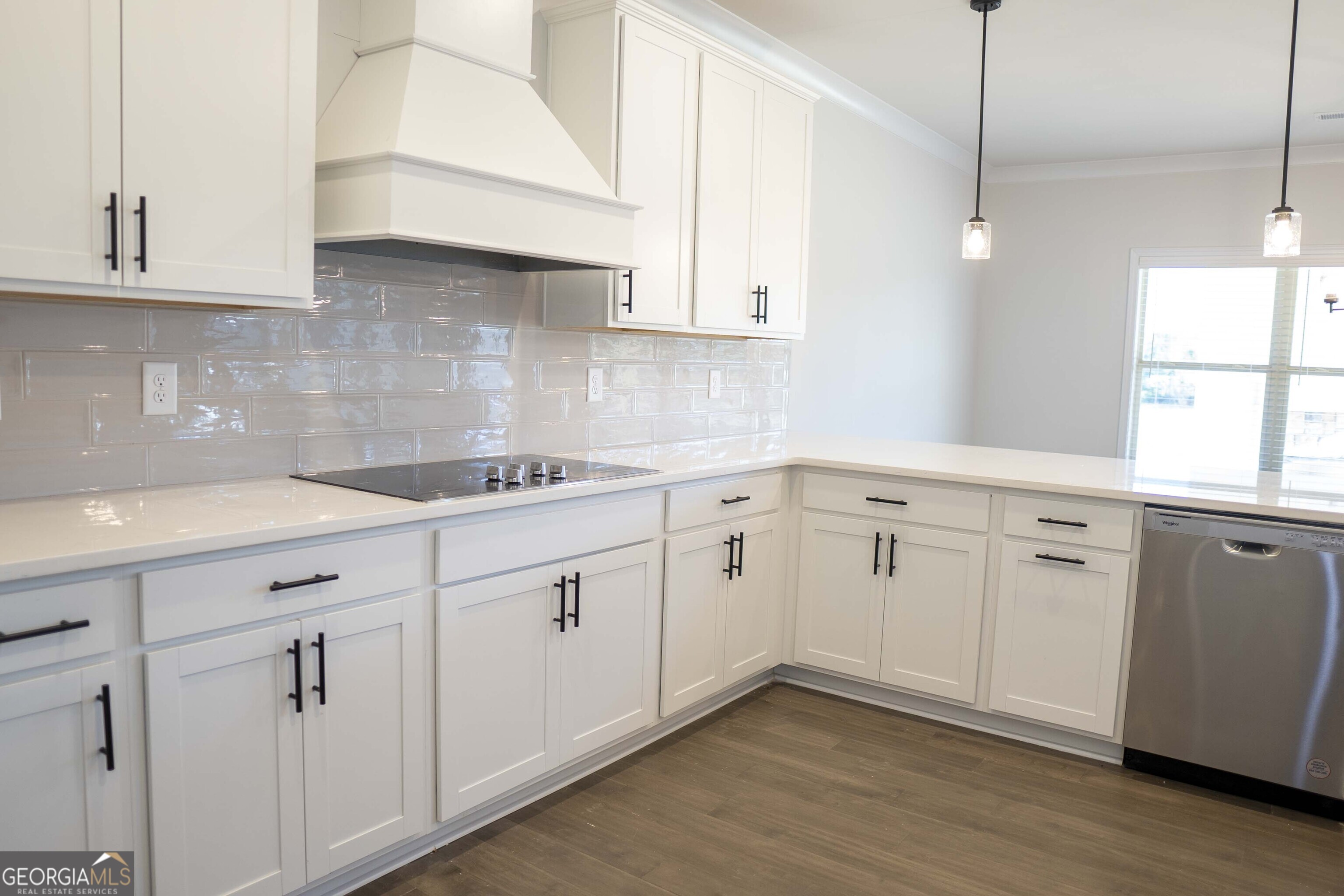 600 Beaver Court Perry, GA 31069 - Photo 18 of 48 a kitchen with white cabinets white appliances and sink