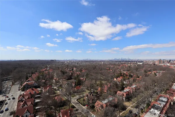 a lobby with furniture and a rug