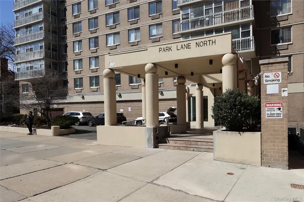 a view of a building with a street