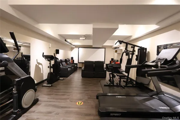 a view of cars parked on the side of a street