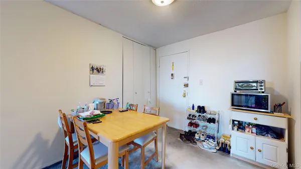 a room with furniture and a baby crib