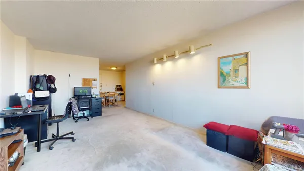 a view of a workspace with furniture