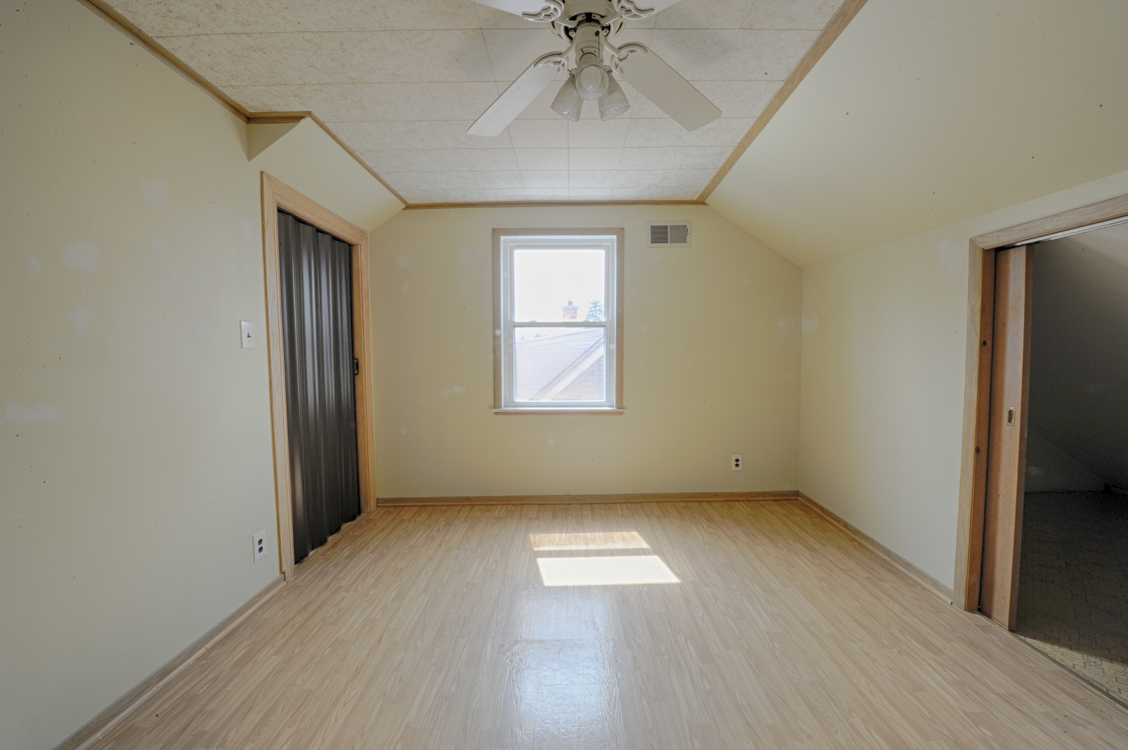 339 Clayton Road Hillside, IL 60162 - Photo 8 of 18 a view of empty room with wooden floor and fan