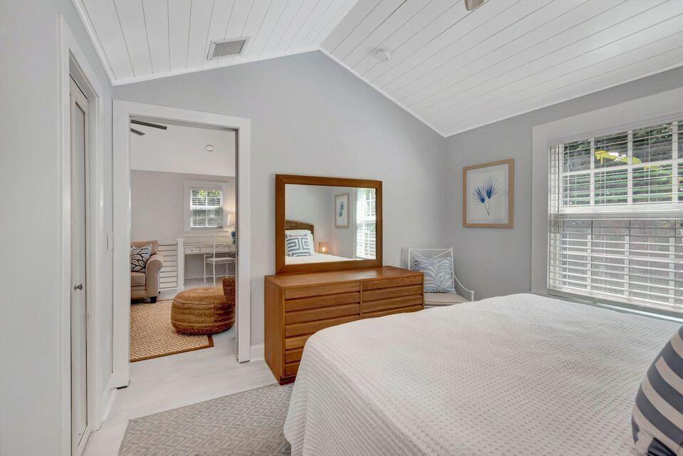 235 Dyer Road, Unit TREEHOUSE West Palm Beach, FL 33405 - Photo 16 of 20 a bedroom with a bed and a window