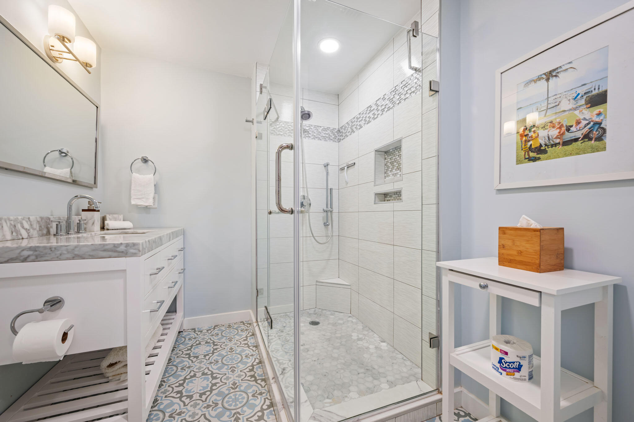 235 Dyer Road, Unit TREEHOUSE West Palm Beach, FL 33405 - Photo 17 of 20 a spacious bathroom with a granite countertop sink a mirror and shower