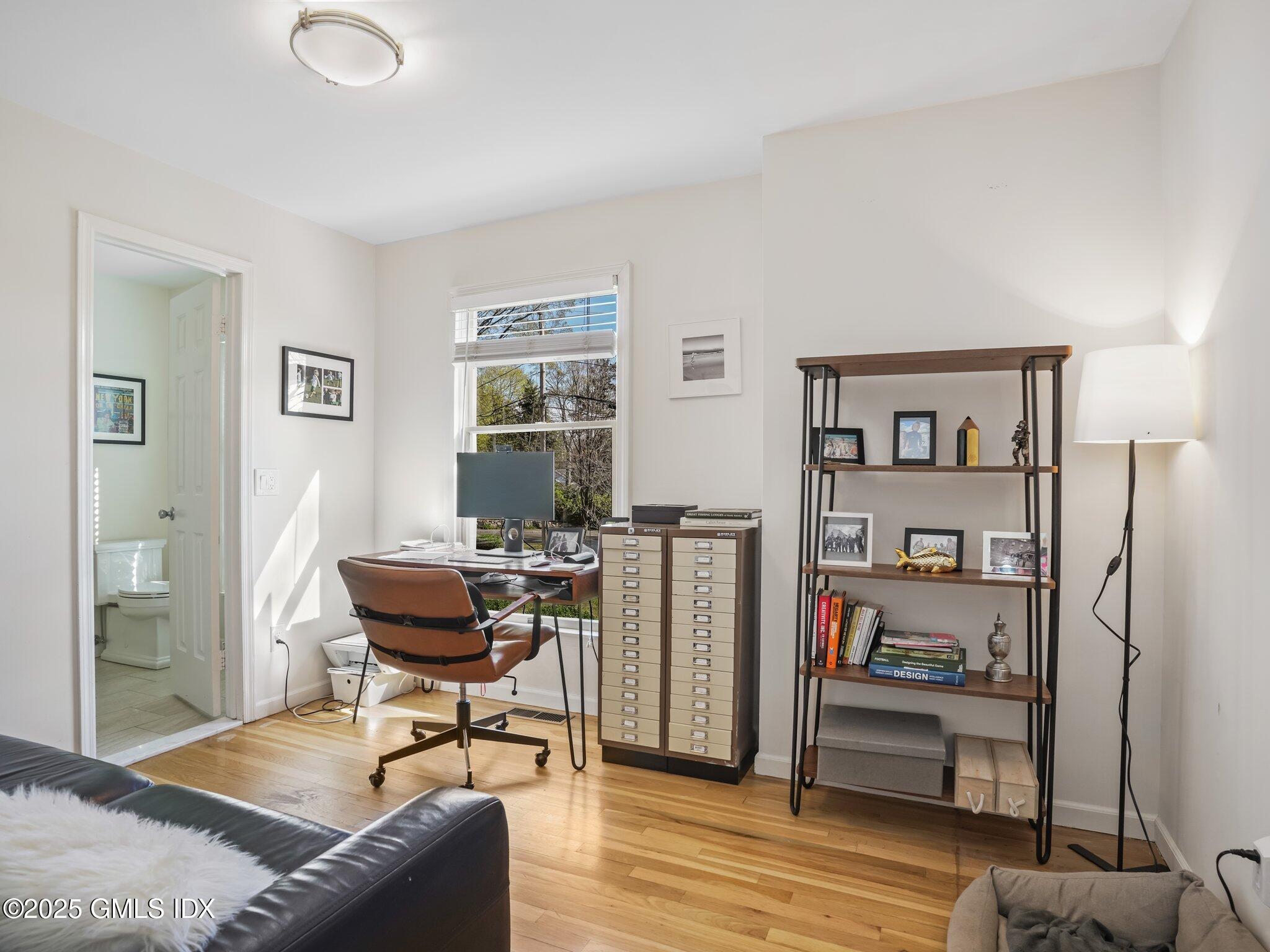 6 Coventry Lane Riverside, CT 06878 - Photo 12 of 18 a living room with furniture and a wooden floor