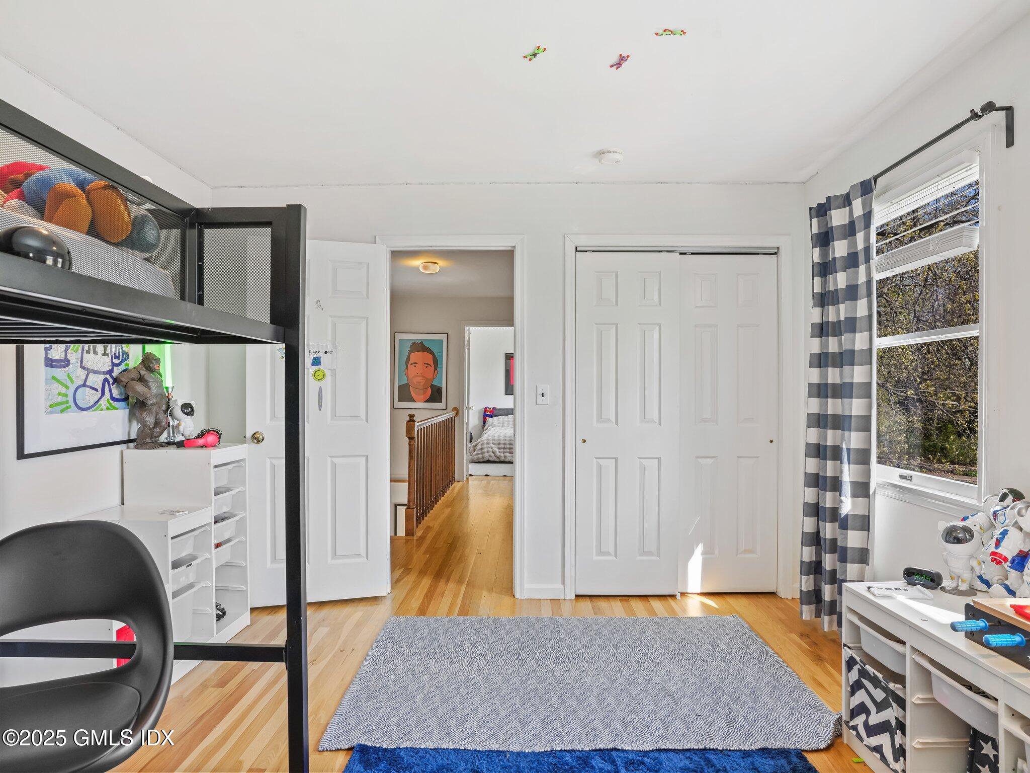 6 Coventry Lane Riverside, CT 06878 - Photo 16 of 18 a bed room with a bed and a couch