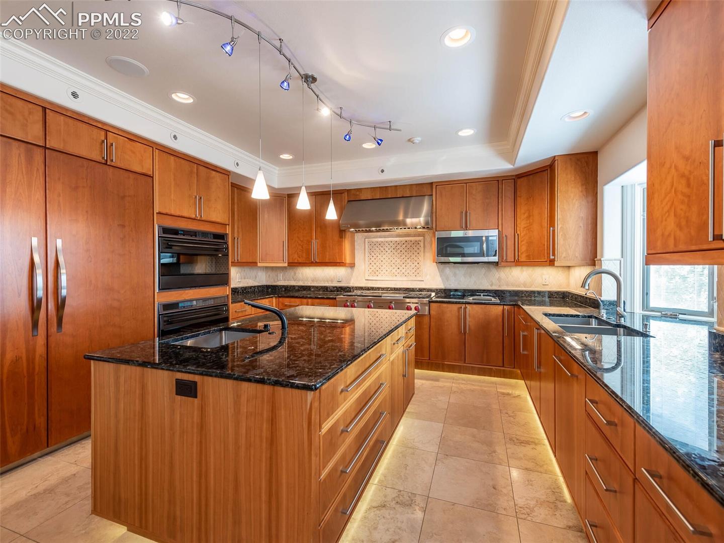 5 Alta Vista Road Colorado Springs, CO 80906 - Photo 11 of 49 Wolf appliances, Cherry cabinets, Solid Granite countertops
