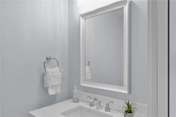 a bathroom with a toilet and a sink