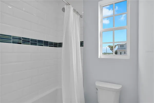 a view of entryway with washer and dryer