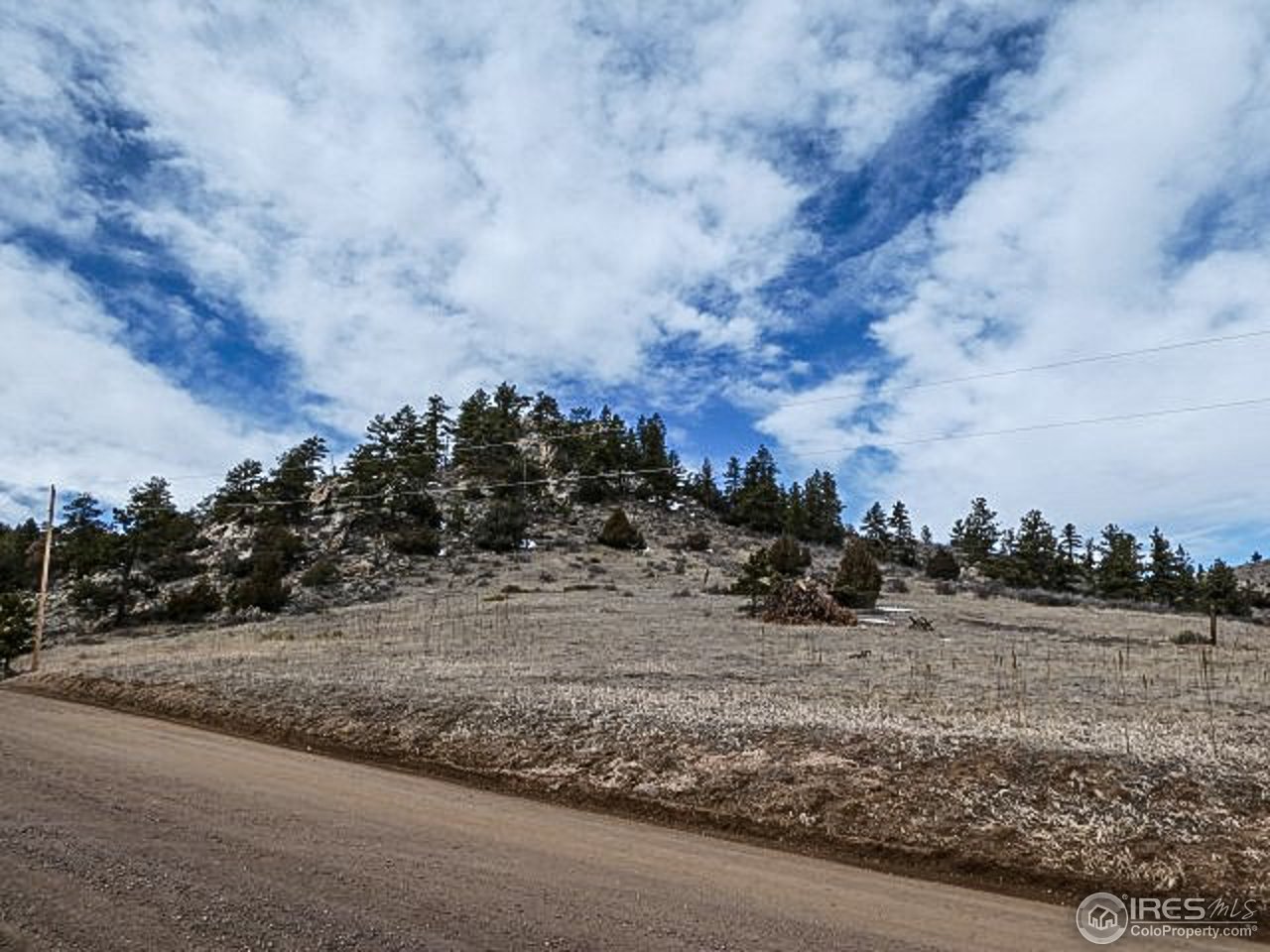 795 Eiger Road Livermore, CO 80536 - Photo 15 of 19 looking at lot from Eiger Rd.