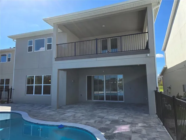 a bathroom with a double vanity sink and mirror