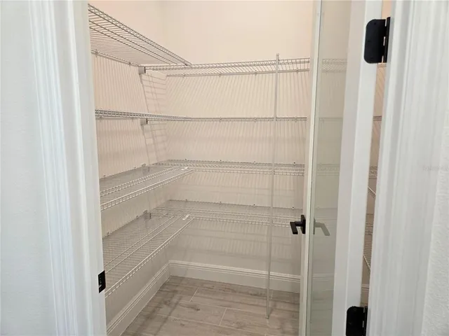 a spacious bathroom with a bathtub and a sink