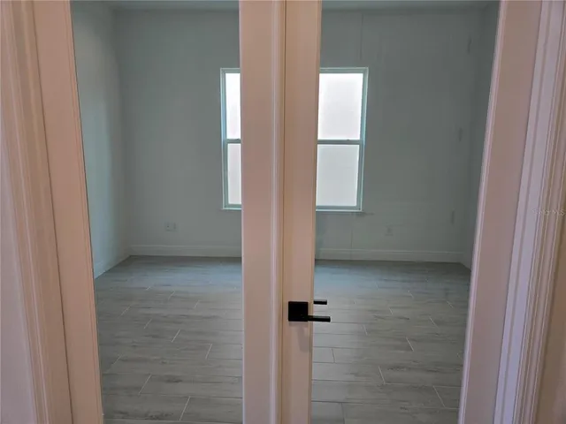 a view of a room with racks on the wall