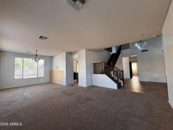 a kitchen with a stove a refrigerator and a sink