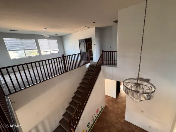 a view of a floor to ceiling window and an outdoor view