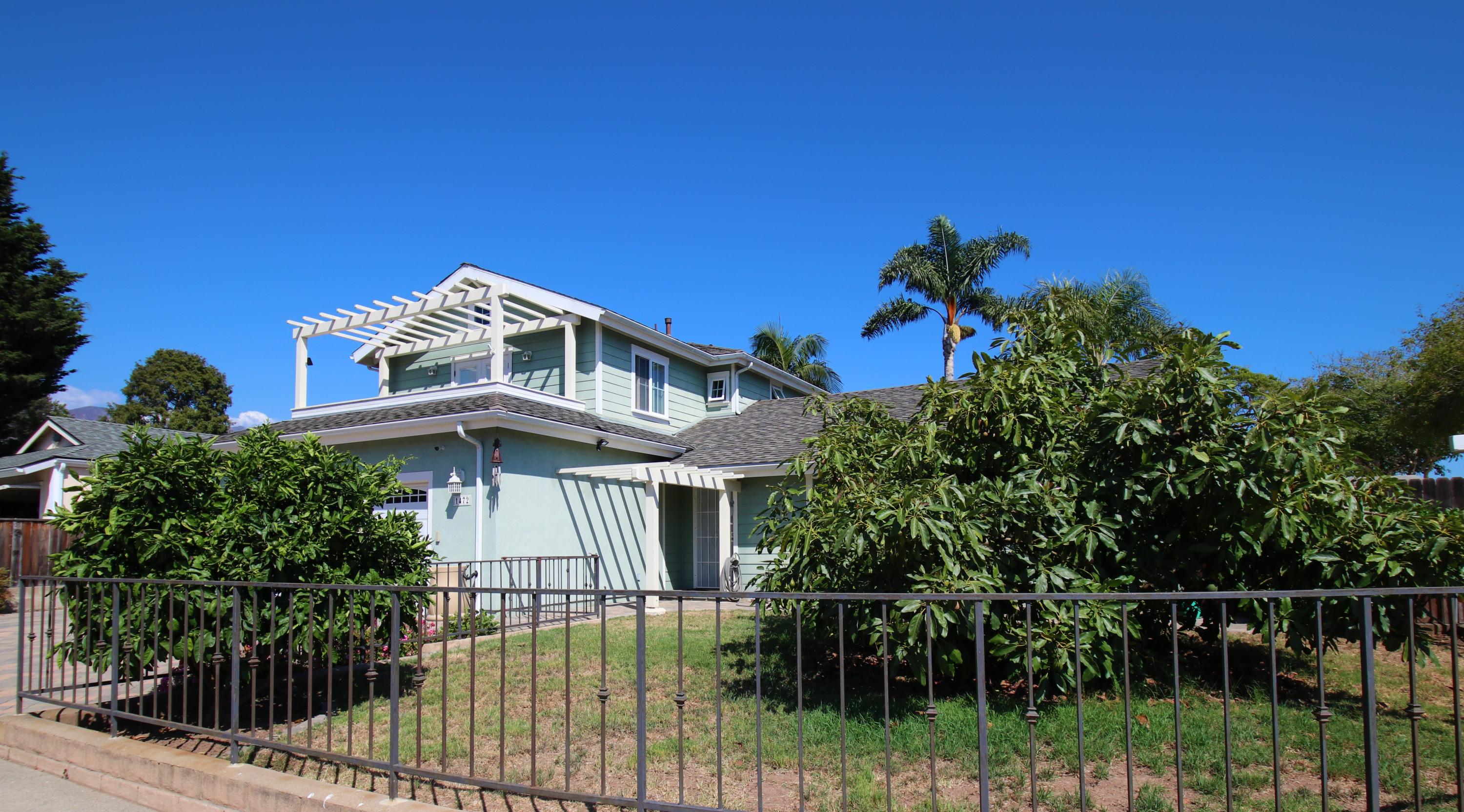 1472 Eucalyptus Street Carpinteria, CA 93013 - Photo 2 of 18 a view of a house with a yard
