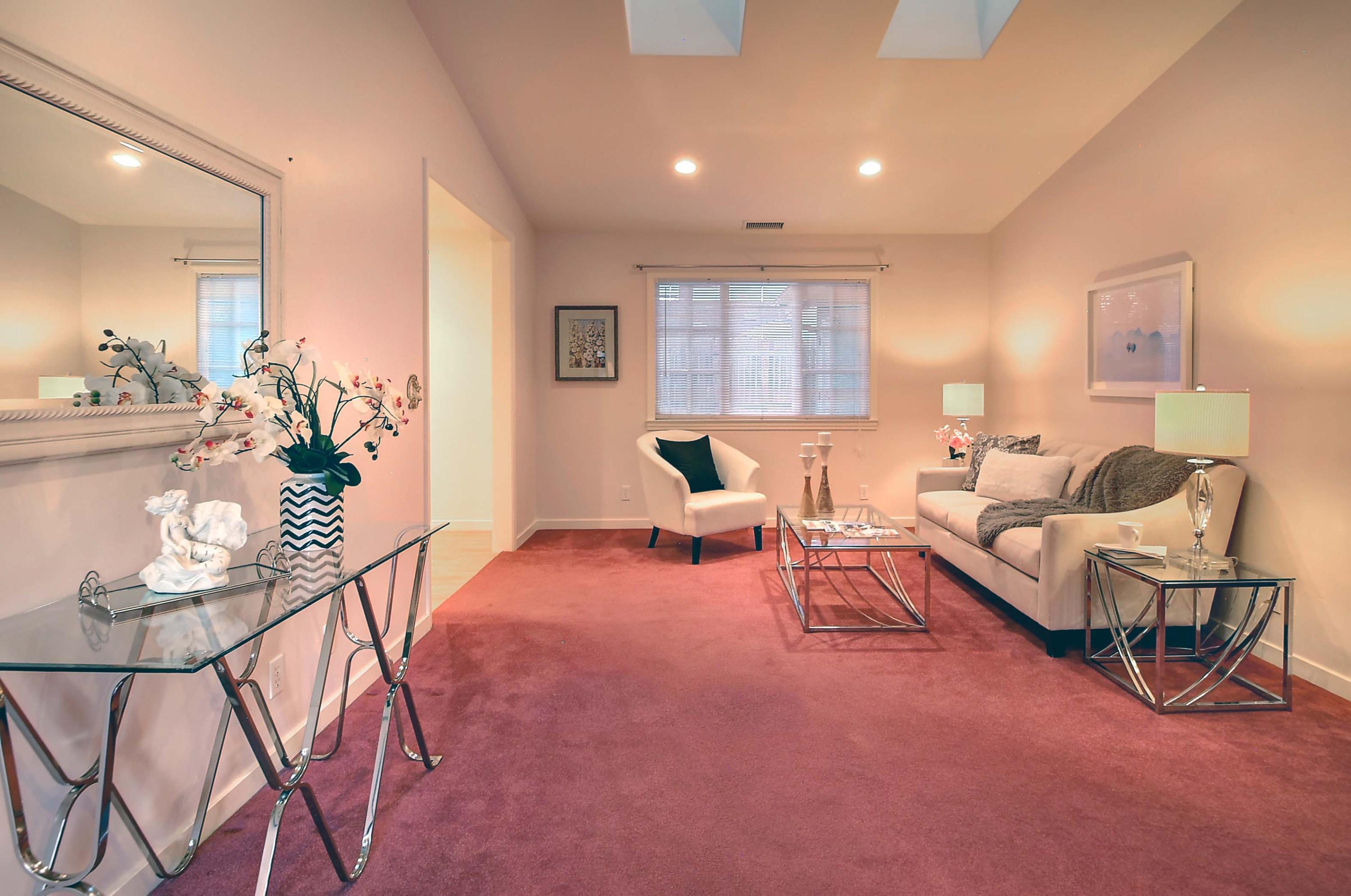 1472 Eucalyptus Street Carpinteria, CA 93013 - Photo 3 of 18 a living room with furniture and a wooden floor