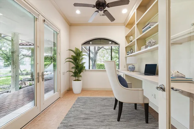 a view of an entryway with wooden floor and a rug