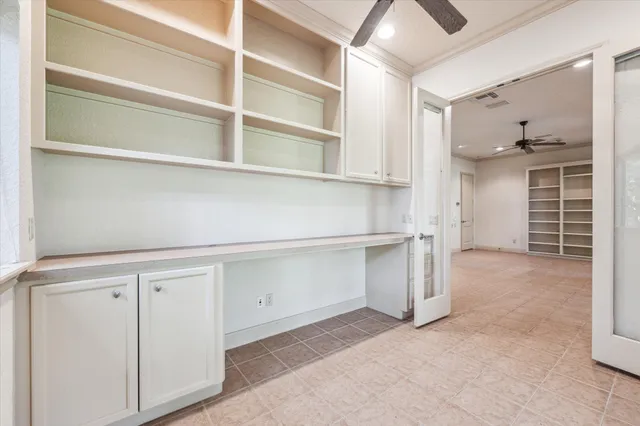 a view of cabinets and window