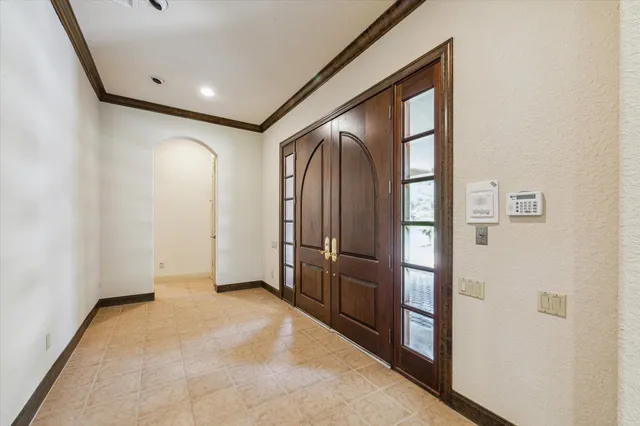 a view of entryway with wooden walls