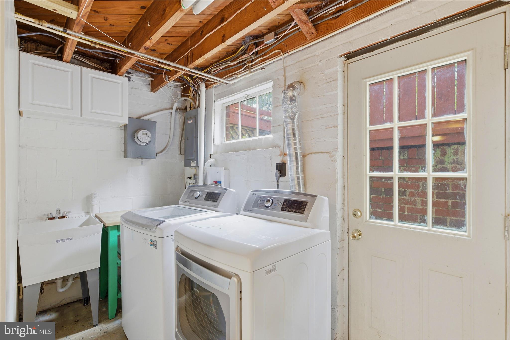5721 Forest Road Cheverly, MD 20785 - Photo 34 of 49 Laundry room with door out to backyard