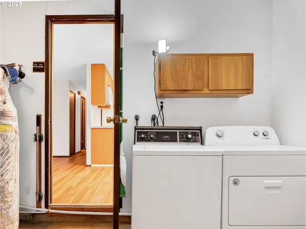 a utility room with dryer and washer