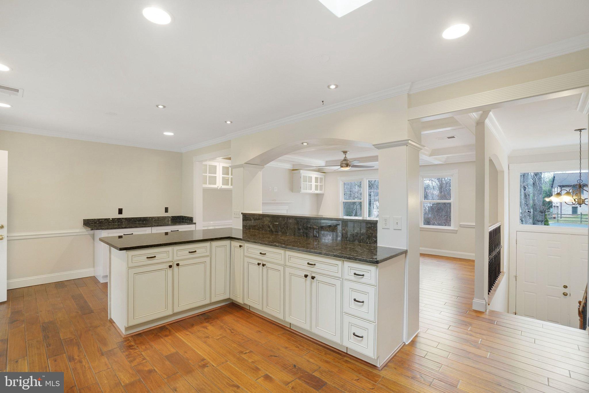 3412 Knox Road Annandale, VA 22003 - Photo 11 of 54 a kitchen with granite countertop a sink and cabinets