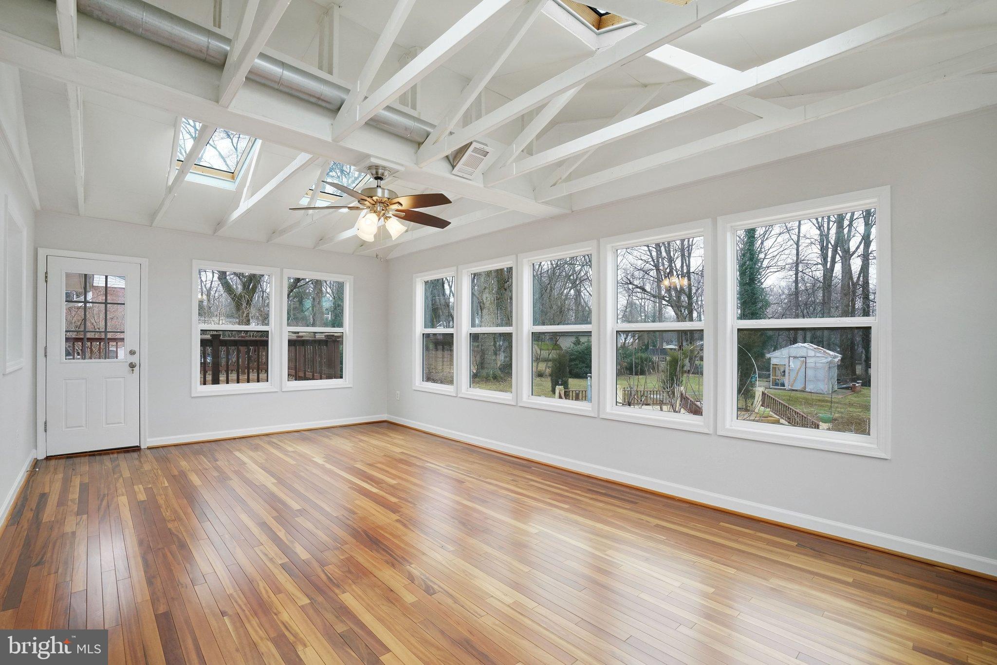 3412 Knox Road Annandale, VA 22003 - Photo 16 of 54 a view of an empty room with a window and wooden floor
