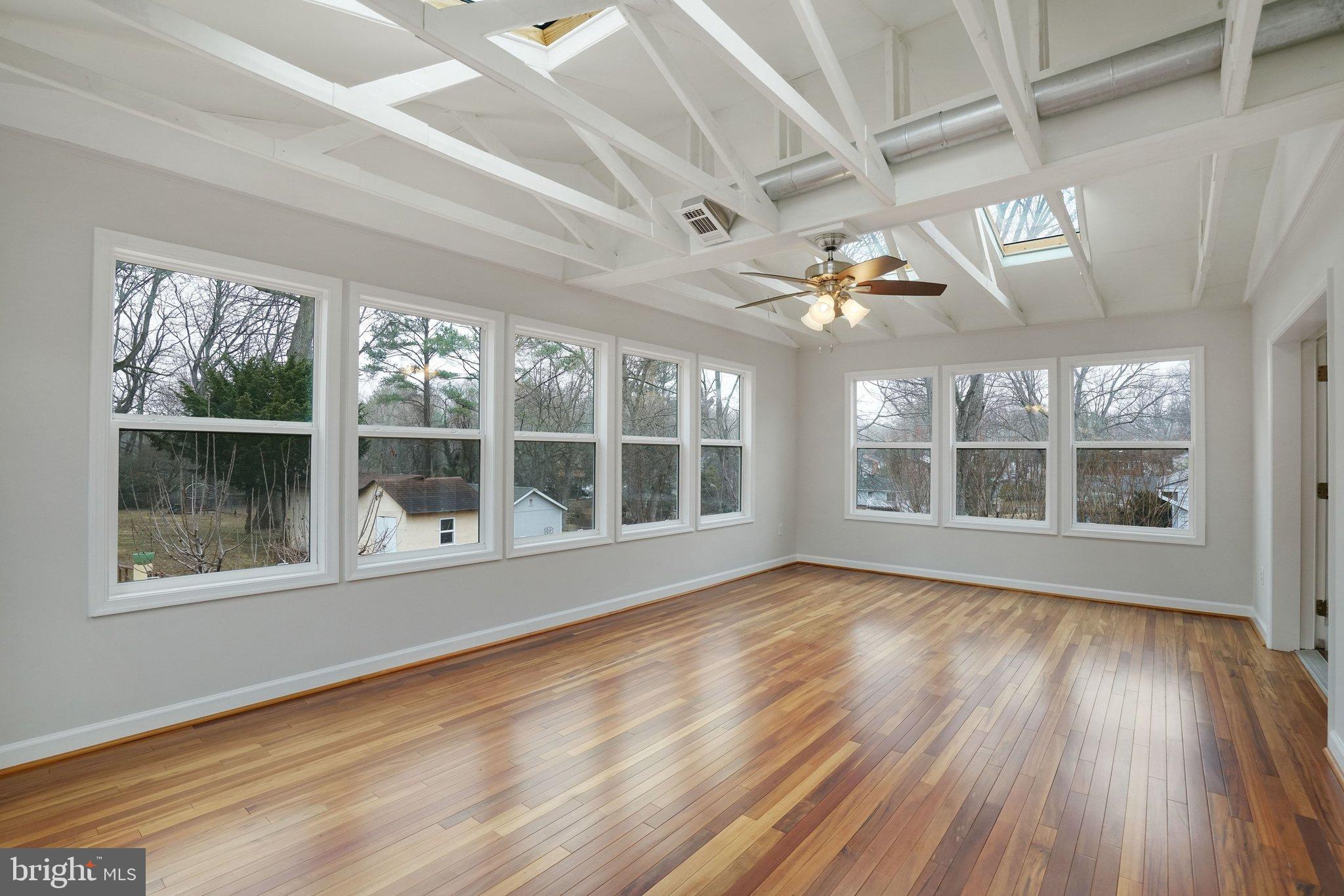 3412 Knox Road Annandale, VA 22003 - Photo 19 of 54 a view of an empty room with wooden floor and a window