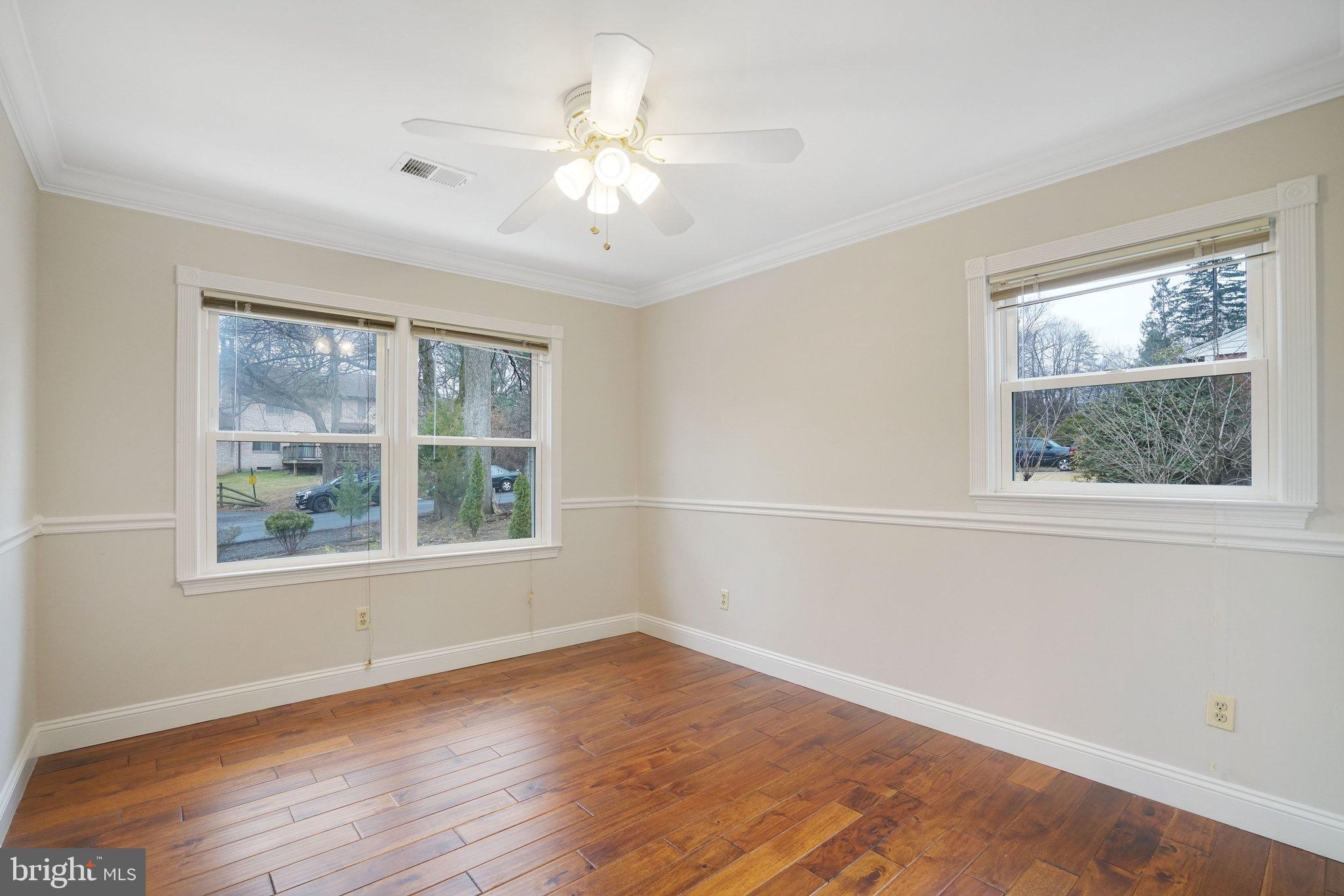 3412 Knox Road Annandale, VA 22003 - Photo 26 of 54 a view of an empty room with wooden floor and a window
