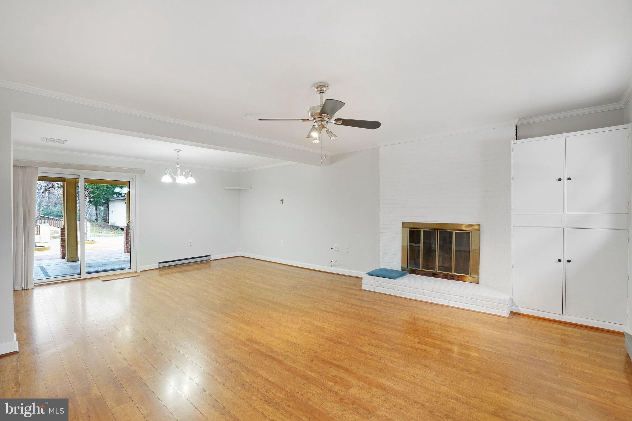 3412 Knox Road Annandale, VA 22003 - Photo 31 of 54 a view of an empty room with window and wooden floor