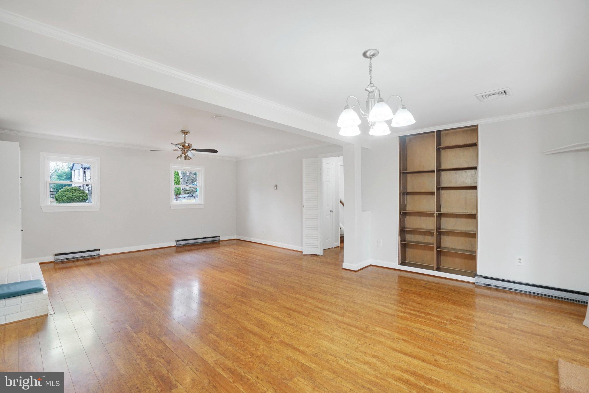 3412 Knox Road Annandale, VA 22003 - Photo 34 of 54 a view of an empty room with window and wooden floor