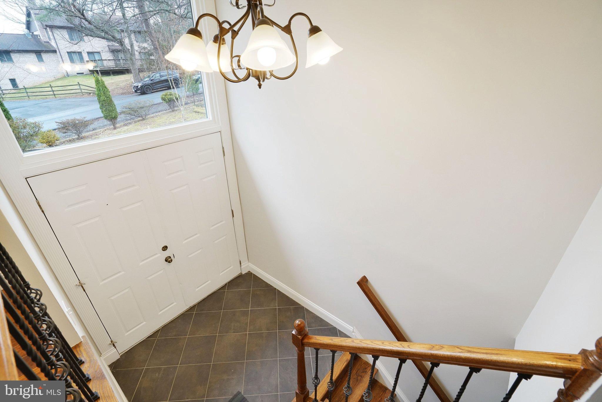 3412 Knox Road Annandale, VA 22003 - Photo 4 of 54 a picture of a room with wooden floor and cabinets