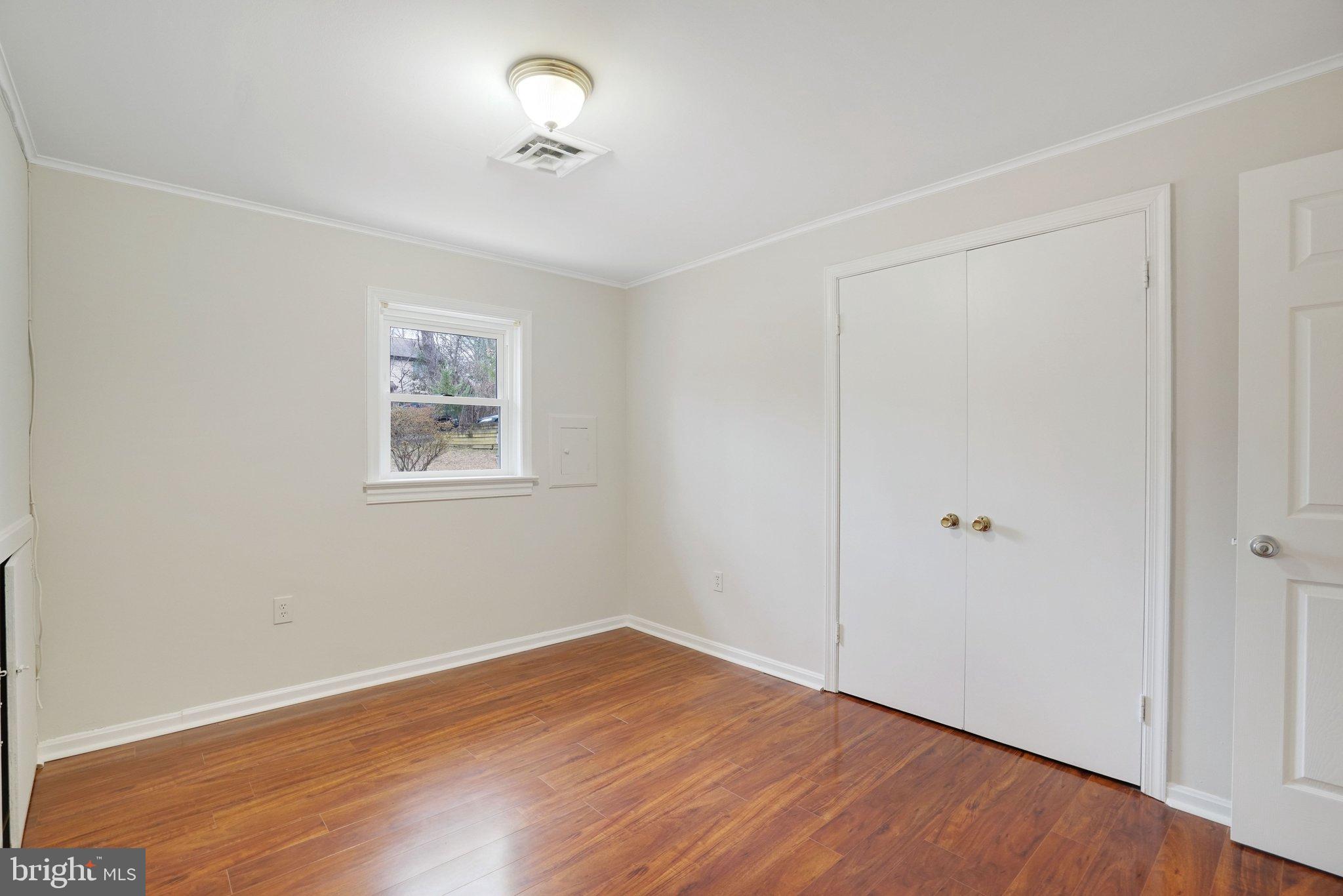 3412 Knox Road Annandale, VA 22003 - Photo 46 of 54 a view of empty room with wooden floor and fan