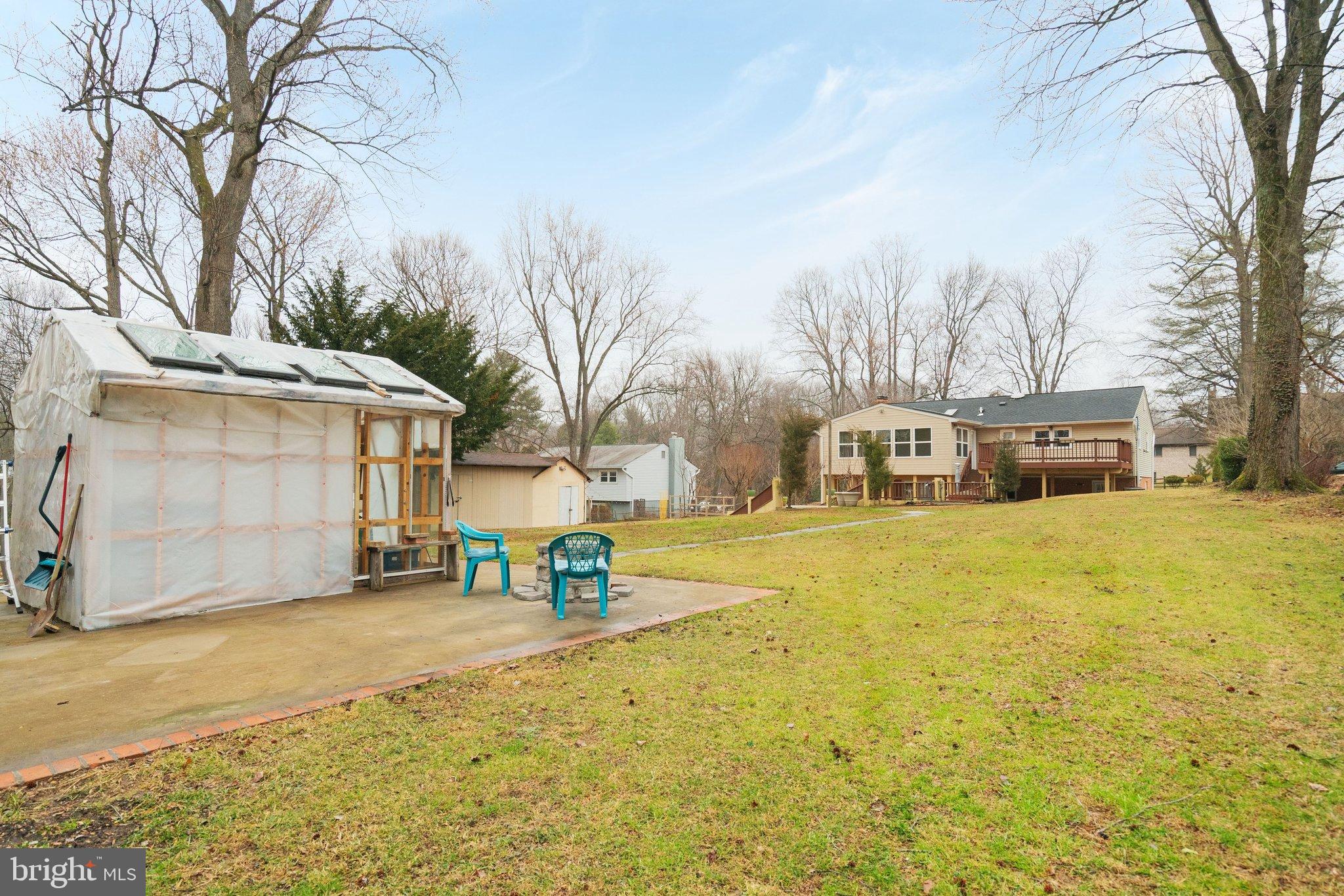 3412 Knox Road Annandale, VA 22003 - Photo 50 of 54 a yellow house with trees in front of it