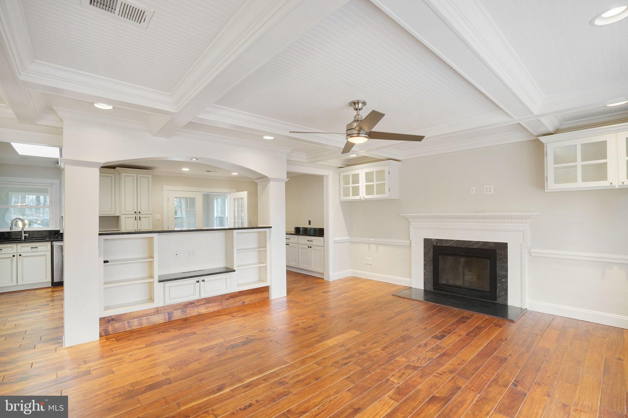 3412 Knox Road Annandale, VA 22003 - Photo 7 of 54 a view of empty room with wooden floor and fireplace