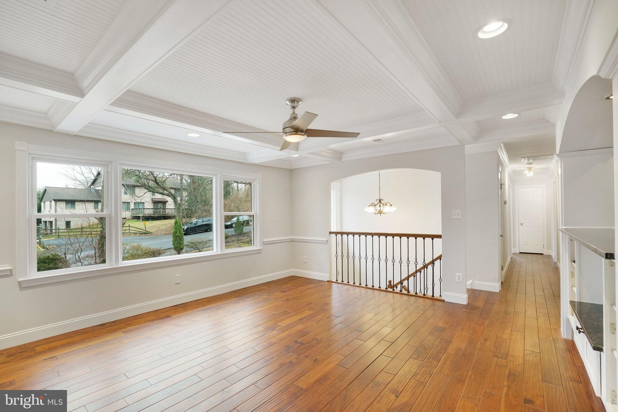 3412 Knox Road Annandale, VA 22003 - Photo 9 of 54 an empty room with wooden floor and windows