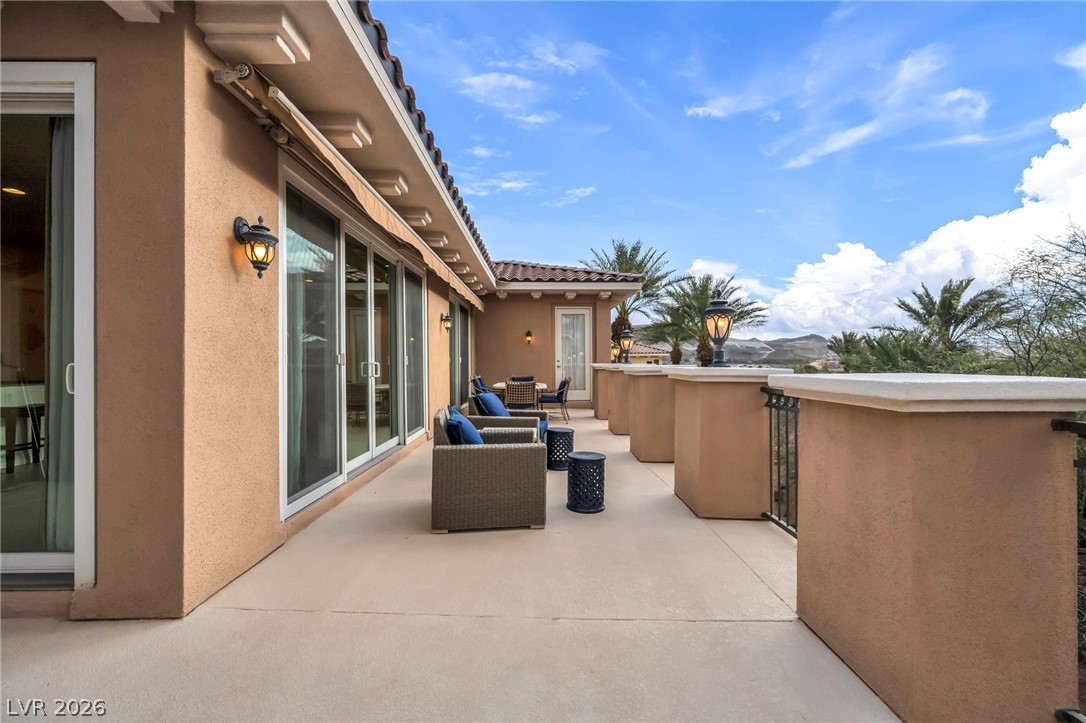 75 Luce Del Sole, Unit 3 Henderson, NV 89011 - Photo 50 of 81 Terrace Patio with entry to Living Room and Kitchen