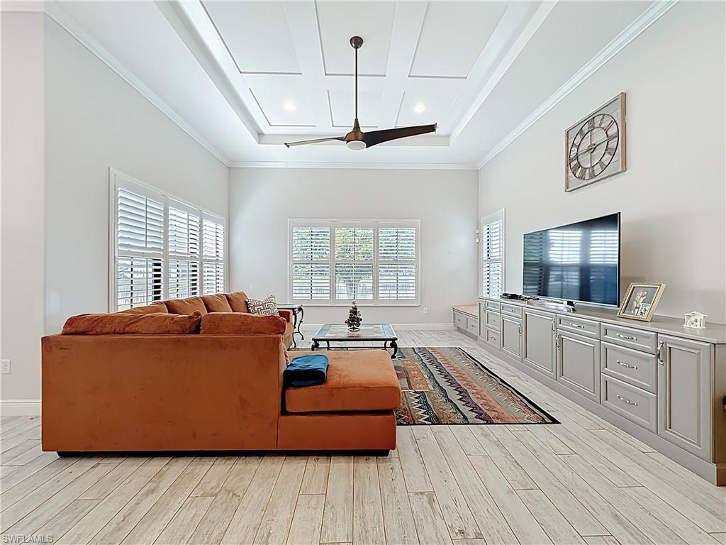 5550 Ferrari Avenue Ave Maria, FL 34142 - Photo 18 of 50 a living room with furniture flat screen tv and window