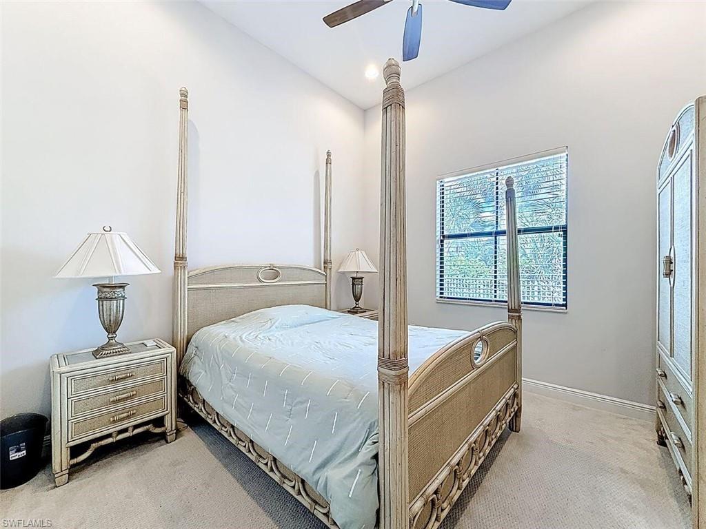 5550 Ferrari Avenue Ave Maria, FL 34142 - Photo 36 of 50 a bed room with a bed and a window