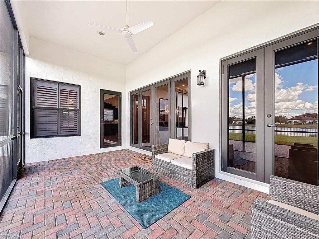 5550 Ferrari Avenue Ave Maria, FL 34142 - Photo 43 of 50 a living room with furniture and a rug