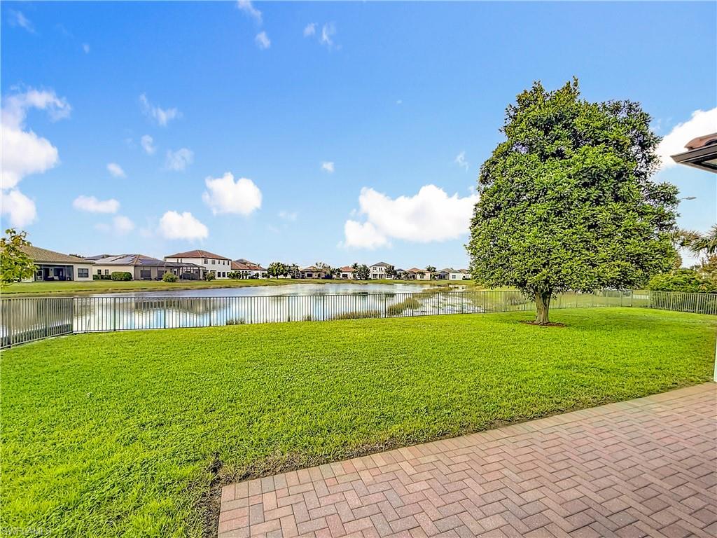 5550 Ferrari Avenue Ave Maria, FL 34142 - Photo 44 of 50 a view of a lake with a big yard