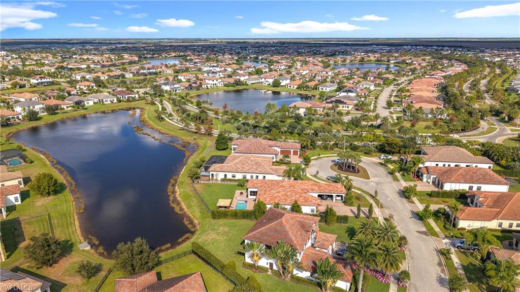 5550 Ferrari Avenue Ave Maria, FL 34142 - Photo 49 of 50 an aerial view of residential houses with outdoor space